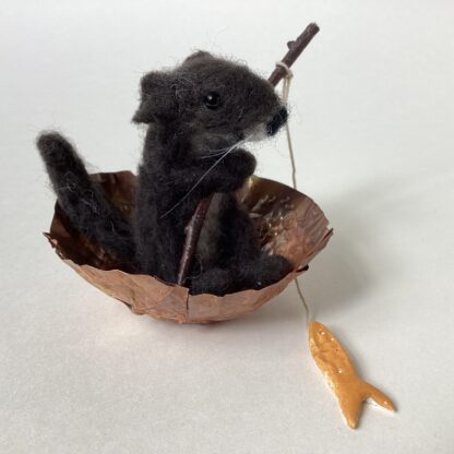 ‘Fishing Otter in a Coracle with Orange Fish’