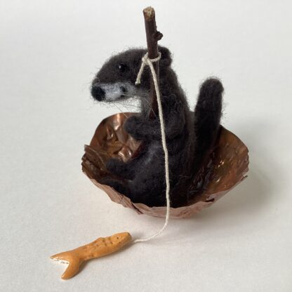 ‘Fishing Otter in a Coracle with Orange Fish’