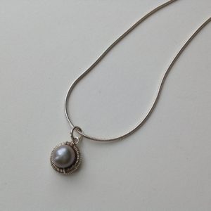 Bound Circle Pendant and Freshwater Pearl