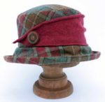 Tweed hat with knitted trim in Quince