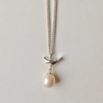 Silver Bird and Pearl Necklace