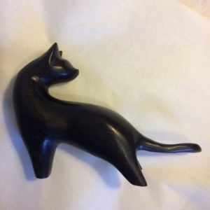 Hand carved wood sculpture Looking Back Cat