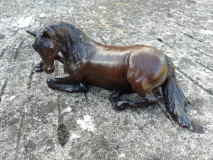 Bronze Resting Horse with head turned