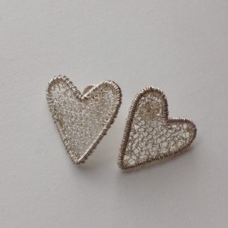 Framed heart studs in silver