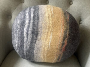 ‘Grey & Orange Felt Pebble Cushion’