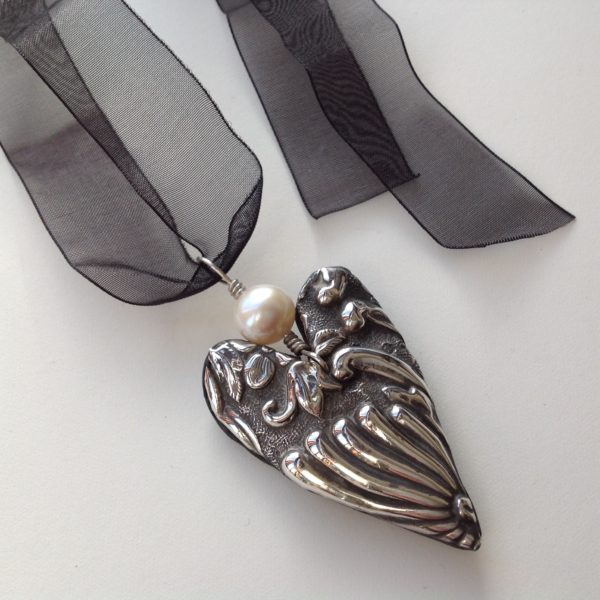 Silver Heart Necklace with relief and ivory pearl