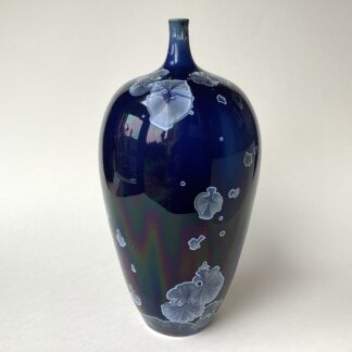 ‘Tall Iridescent Blue Crystalline Bottle’