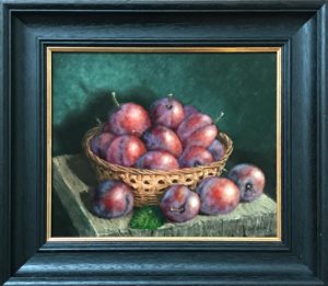 'Plums in Wicker Basket