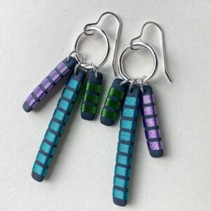 ‘Triple Tassel Drop Earrings’