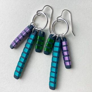 ‘Triple Tassel Drop Earrings’