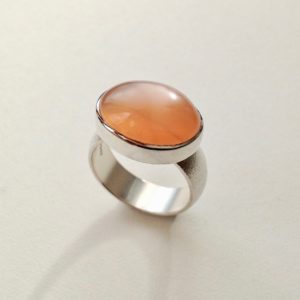 Silver and Oval Orange Moonstone Ring