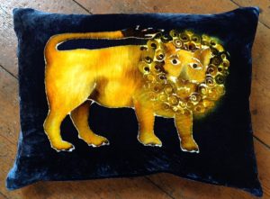 Lion on Blue Cushion