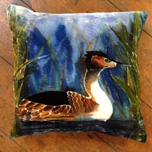 Grebe on Blue