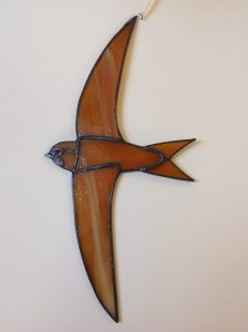 Swift in Stained Glass