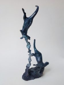 'Two Diving Otters'