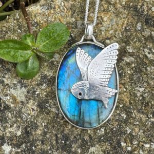 'Silent Flight: Owl over Labradorite' 