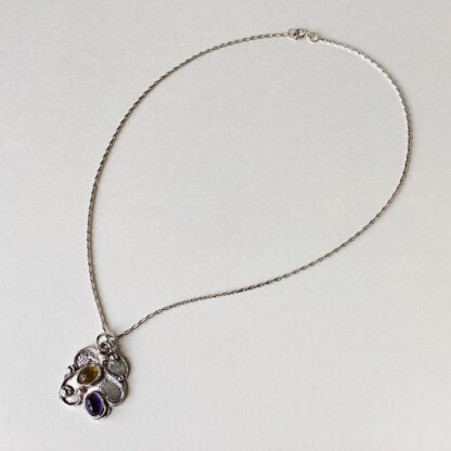 ‘Silver Pendant with Citrine and Amethyst’