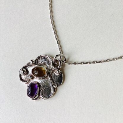 ‘Silver Pendant with Citrine and Amethyst’