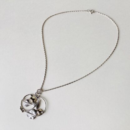‘Silver Pendant with 2 Gold Domes’